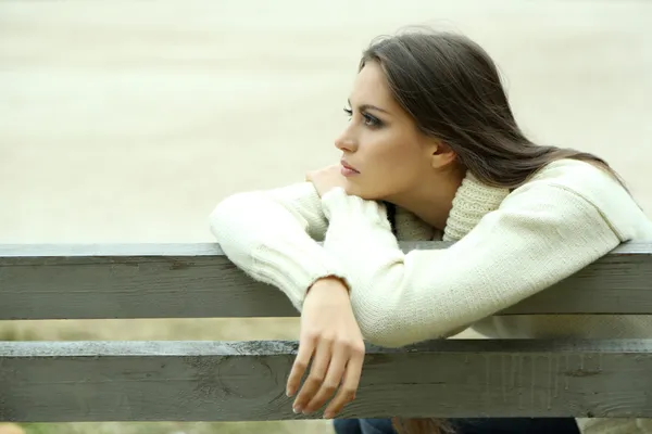 depositphotos_34116553-stock-photo-young-lonely-woman-on-bench